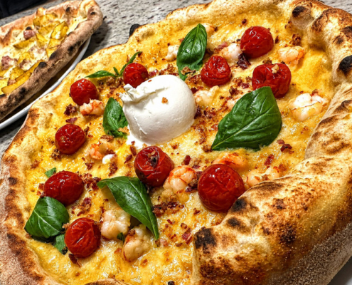 Pizza gourmet preparata nella pizzeria Anima e Cozze a Nicolosi